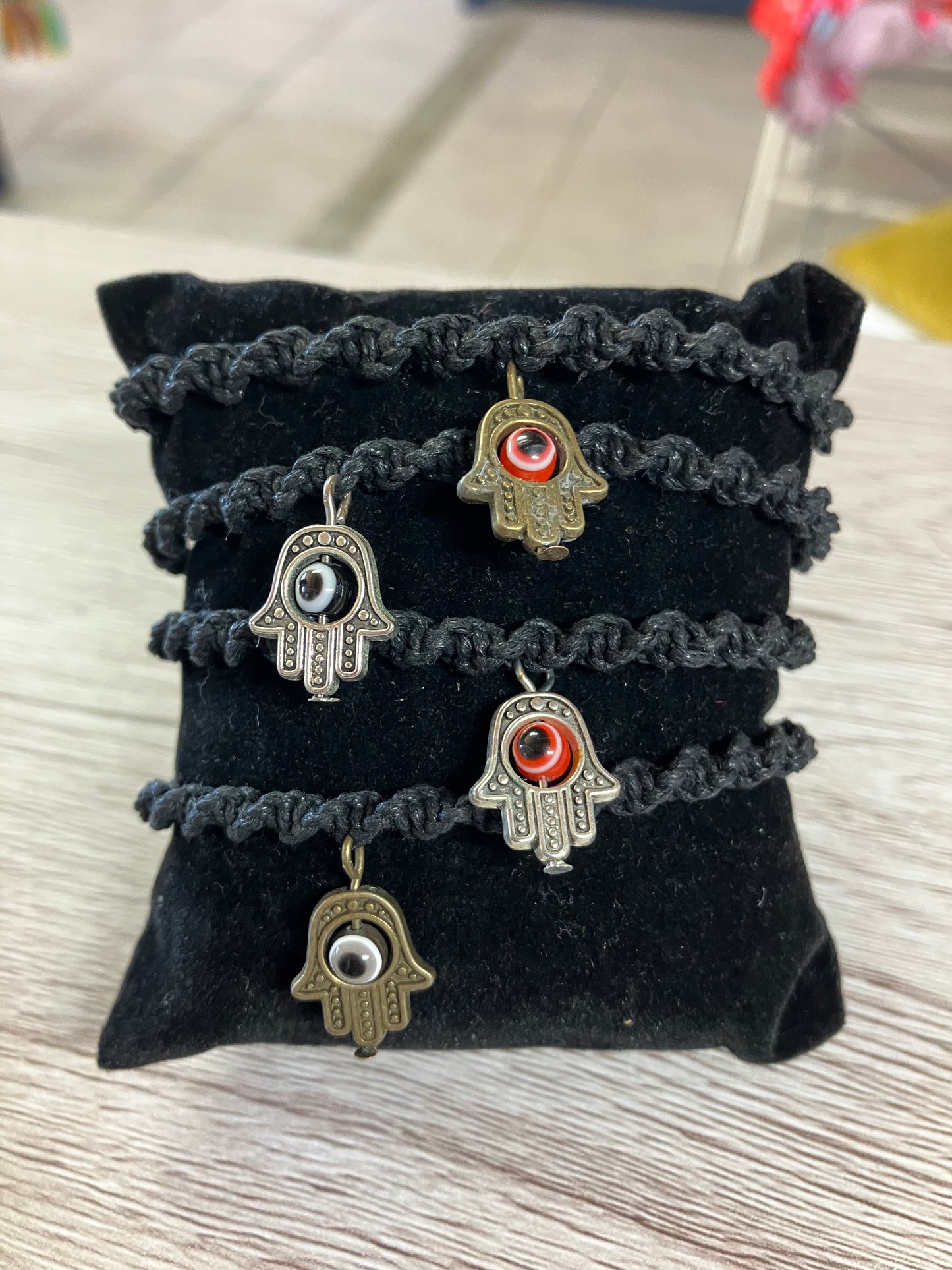 Black macrame bracelet with hamsa hand evil eye