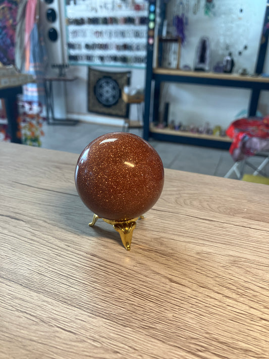 Goldstone Sphere on Stand